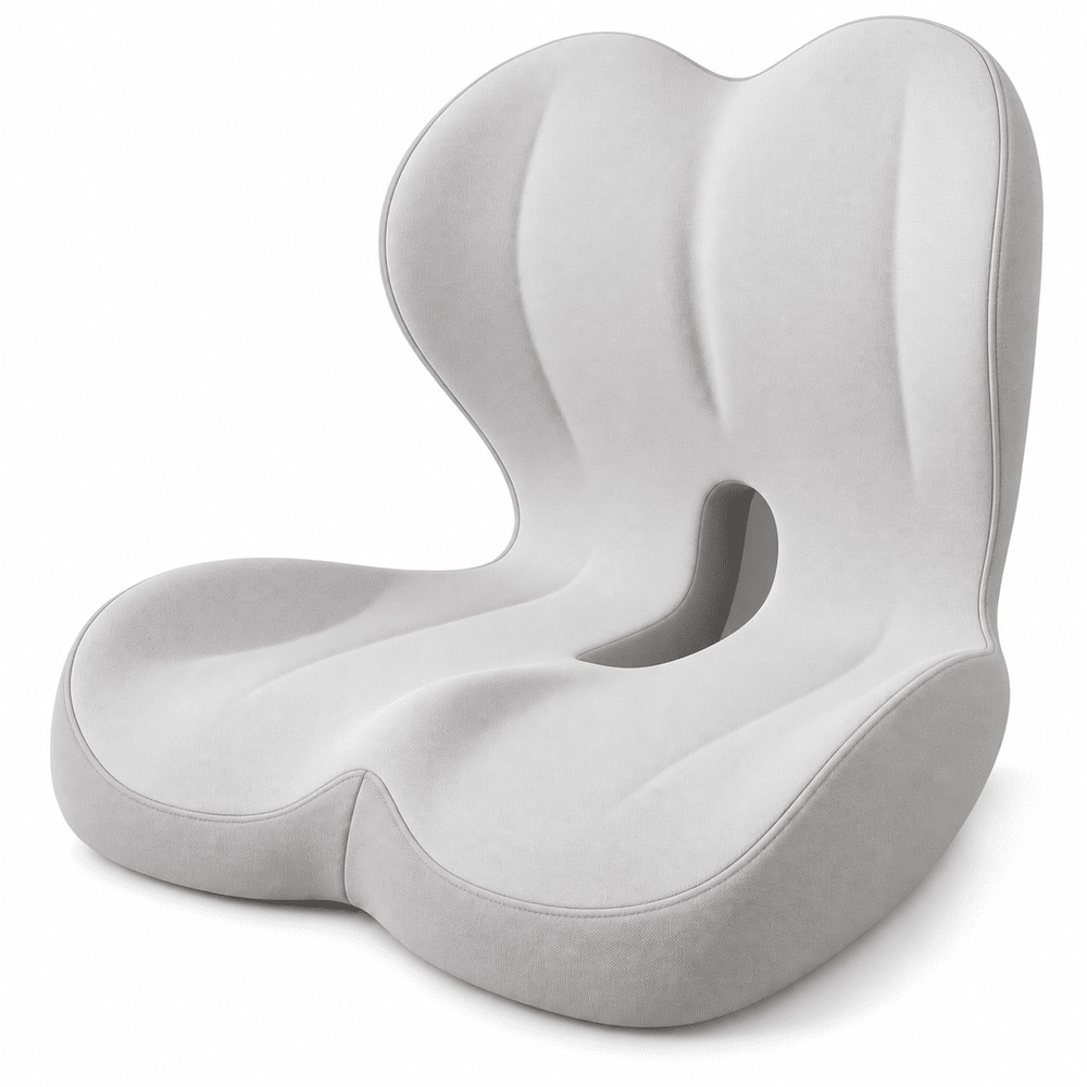 Light gray integrated seat and back cushion with contoured seating and a central opening on a white background