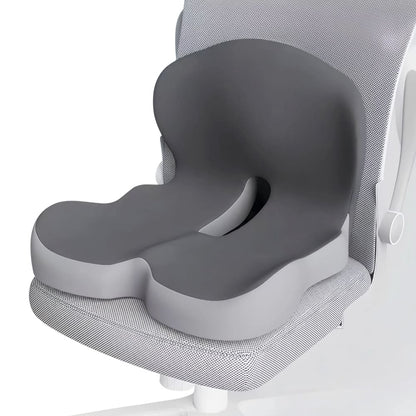 Gray seat cushion on a chair with a white background