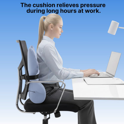 Person sitting at a desk with an ergonomic chair cushion, text indicating it relieves pressure during work.