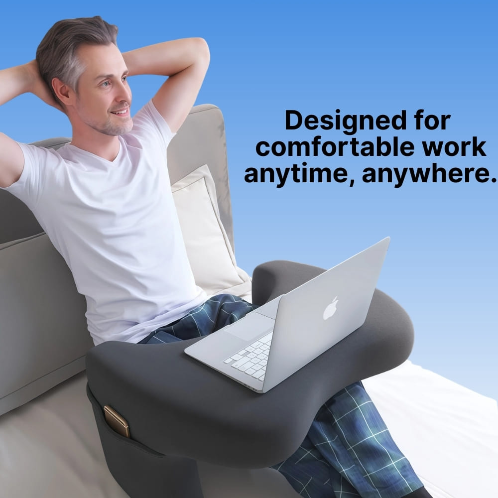 Man using a portable lap desk with a laptop, sitting on a couch with a blue background and text 'Designed for comfortable work anytime, anywhere.'.