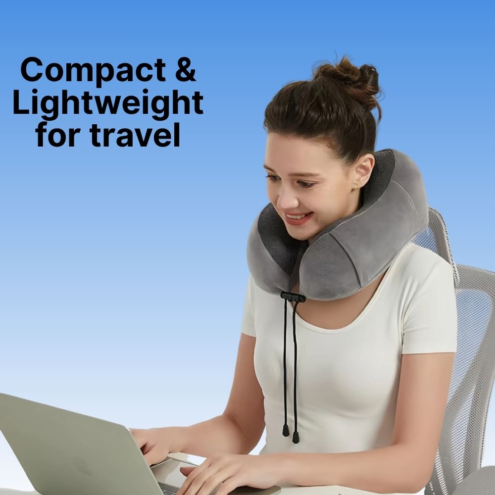 Woman using a travel neck pillow while working on a laptop with a blue gradient background.