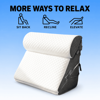 An ergonomic lumbar pillow shown on a light blue gradient background with promotional text and icons reading 'MORE WAYS TO RELAX' and 'SIT BACK', 'RECLINE', and 'ELEVATE'. The pillow has a quilted off-white top section and dark gray side panels with straps.