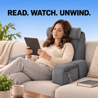 A woman relaxes in a gray reclining armchair on a beige sofa, holding a tablet. The chair has a side pocket holding eyeglasses and is shown in a living room setting with a blue sky graphic background and the text 'READ.