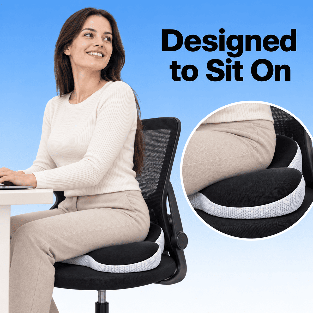 A woman sits on a black mesh office chair with a white and black contoured cushion pad, shown against a blue gradient background with the text 'Designed to Sit On' and a circular inset close-up of the cushion.