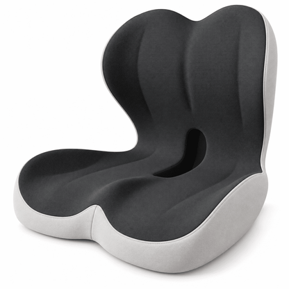 Black and light gray integrated seat and back cushion with a central opening on a white background