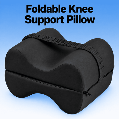 A black foldable knee support pillow with a zippered closure and elasticized top edge, shown on a blue gradient background with the text 'Foldable Knee Support Pillow' at the top.