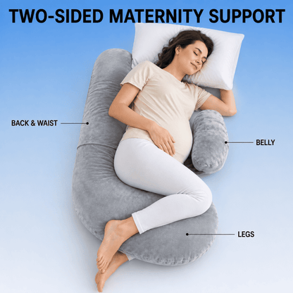 Pregnant side sleeper using a separate head pillow with gray maternity cushions supporting the back and belly