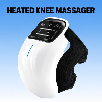 A white heated knee massager with a black control panel and black fabric strap, shown on a blue gradient background with the text 'HEATED KNEE MASSAGER' at the top.