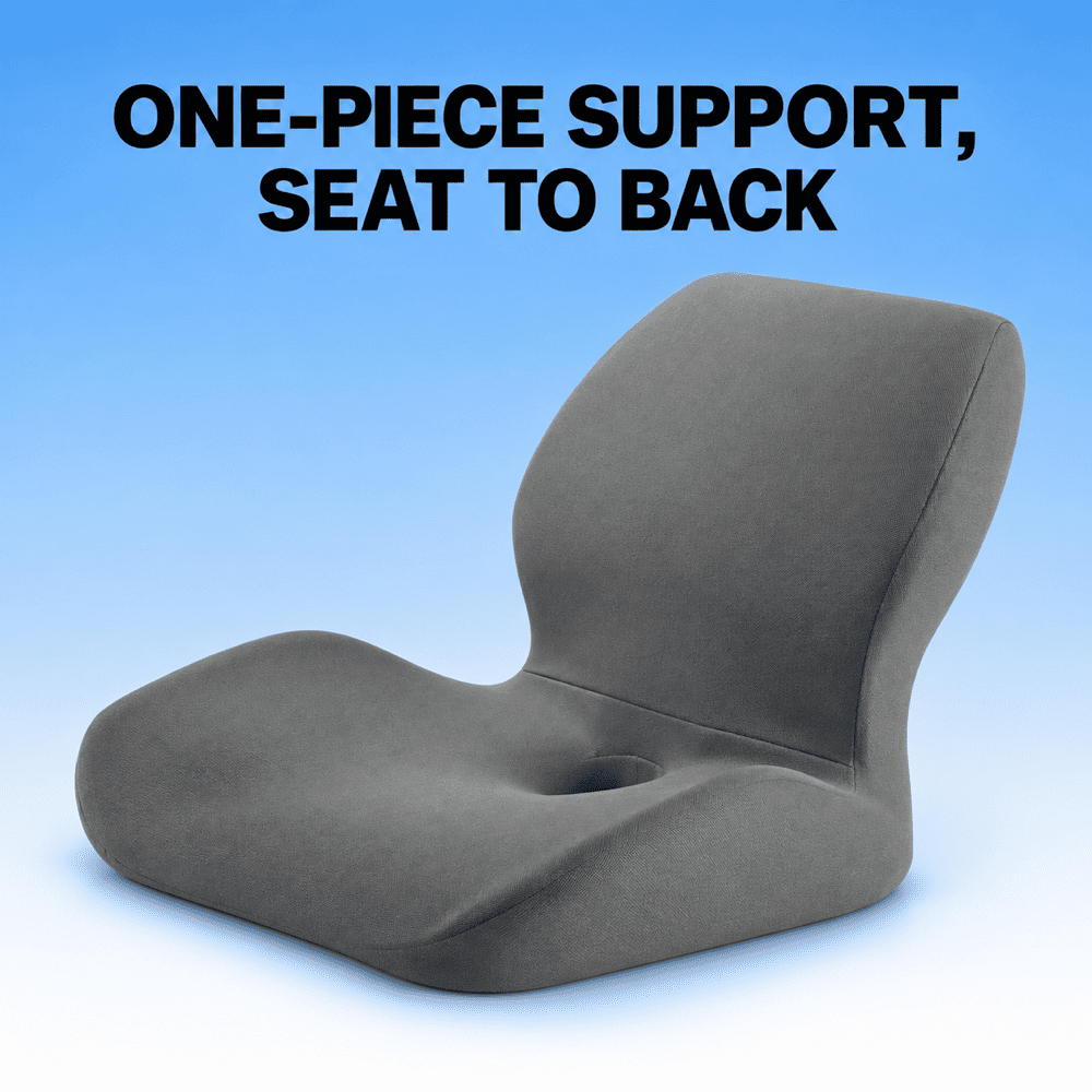 A dark gray contoured seat cushion with a built-in backrest and a central hole, shown against a blue gradient background with the text 'ONE-PIECE SUPPORT, SEAT TO BACK'.