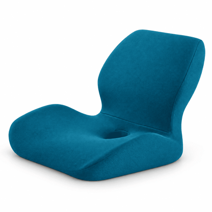 A modern ergonomic floor chair with a curved backrest and seat, upholstered in a textured teal blue fabric, shown on a plain white background.