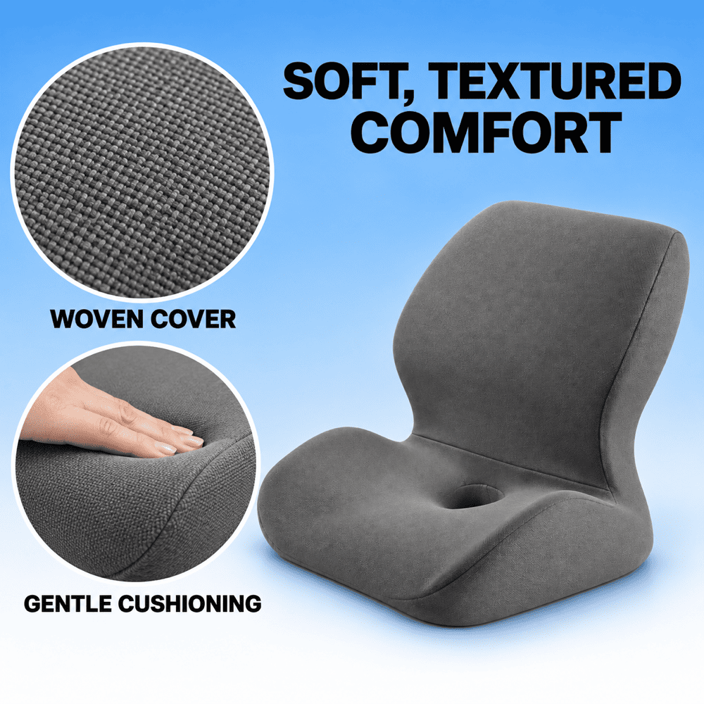 A dark gray contoured lumbar support chair shown on a light blue gradient background with two circular inset detail images and text reading 'SOFT, TEXTURED COMFORT,' 'WOVEN COVER,' and 'GENTLE CUSHIONING.'.