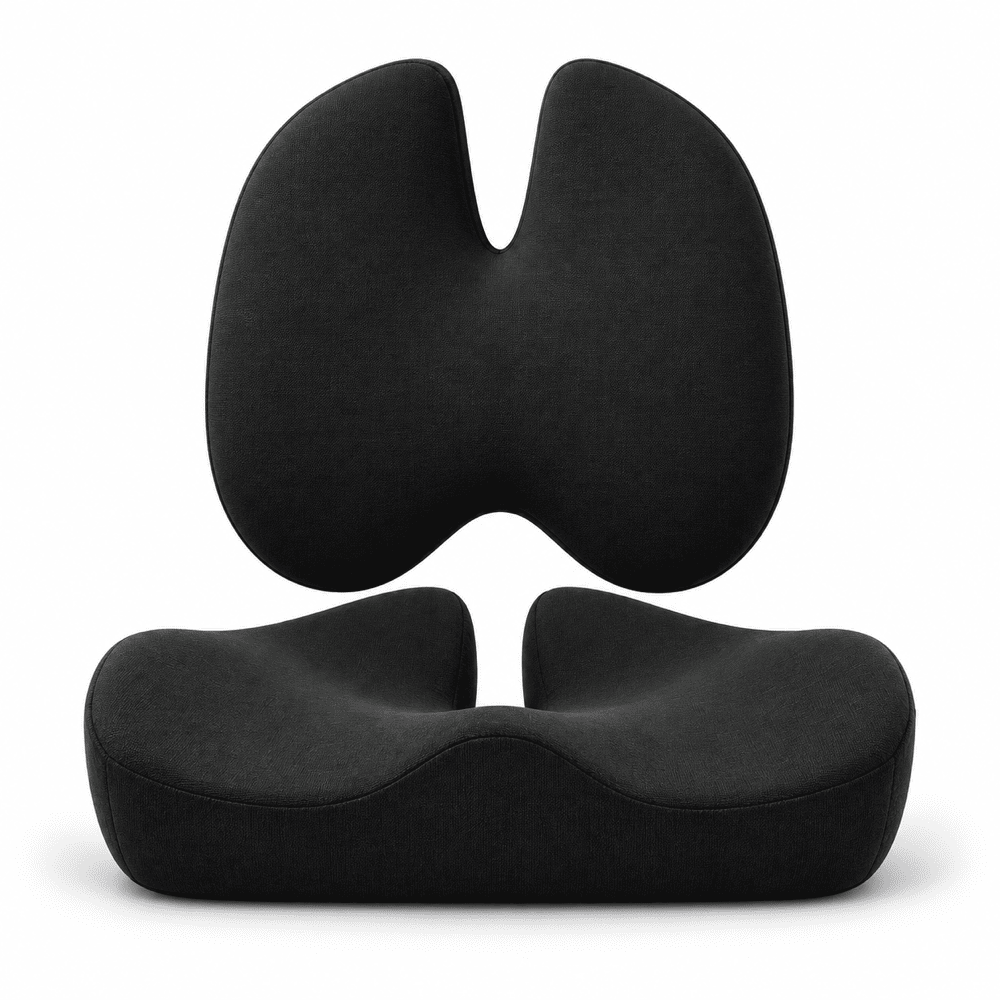 A black ergonomic split-seat cushion shown in two views: a back view with a curved double-arch shape and a front view showing the contoured seat base, on a white background.