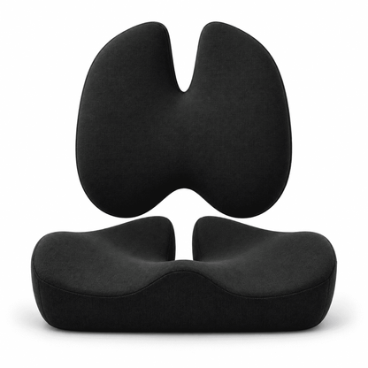 A black ergonomic split-seat cushion shown in two views: a back view with a curved double-arch shape and a front view showing the contoured seat base, on a white background.