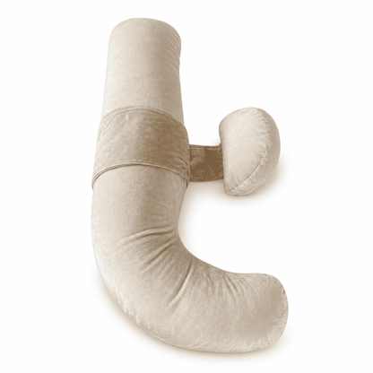 Warm beige velvet adjustable pregnancy pillow with connected belly support cushion on a pure white background