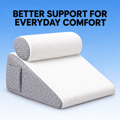A white contoured wedge pillow with a matching cylindrical neck pillow, shown against a blue gradient background with the text 'BETTER SUPPORT FOR EVERYDAY COMFORT'. The pillow features a textured honeycomb pattern on the gray side panels.